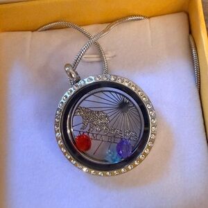 Elegant Silver Pendant Necklace with Red and Purple Accents